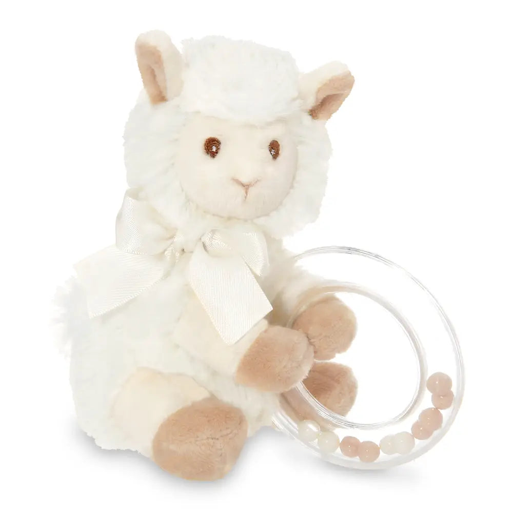 White plush lamb toy with a clear ring and beads on a white background