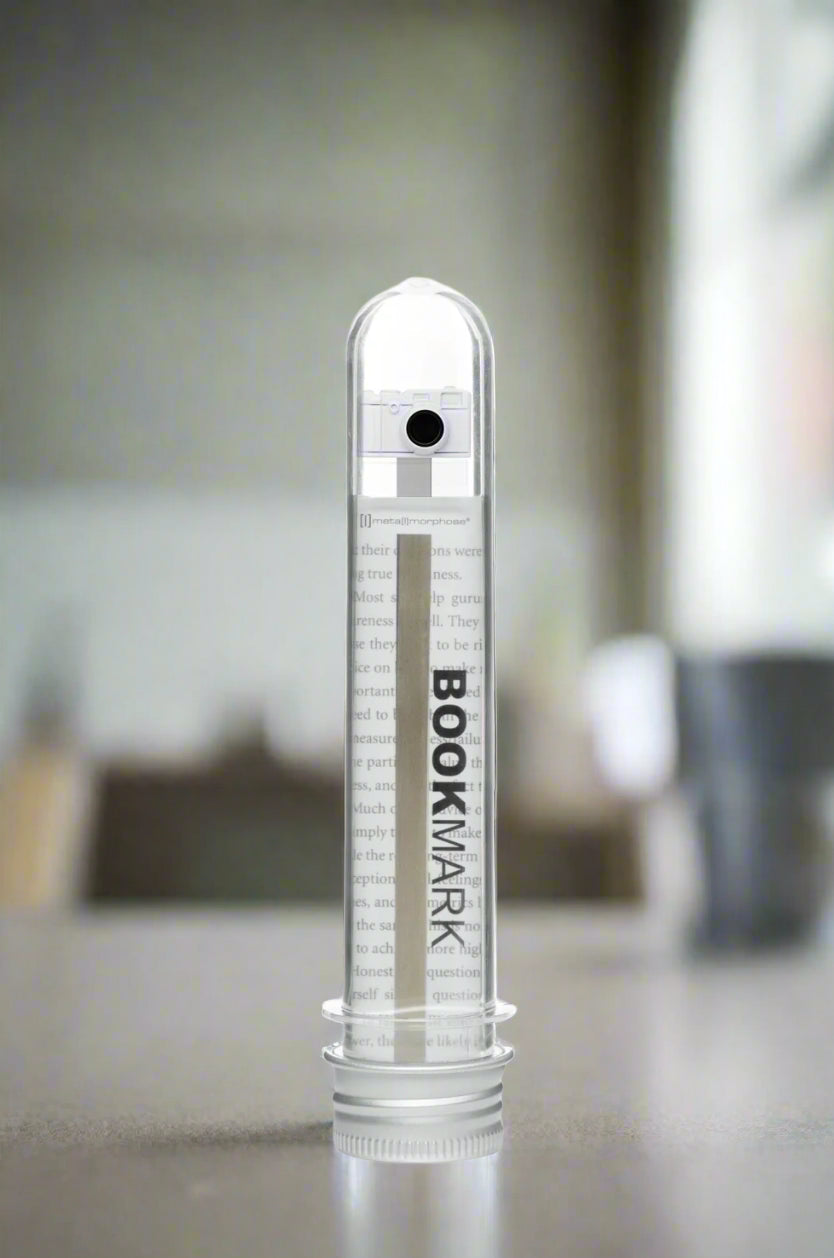 Clear cylindrical container with 'BOOKMARK' branding on a white background