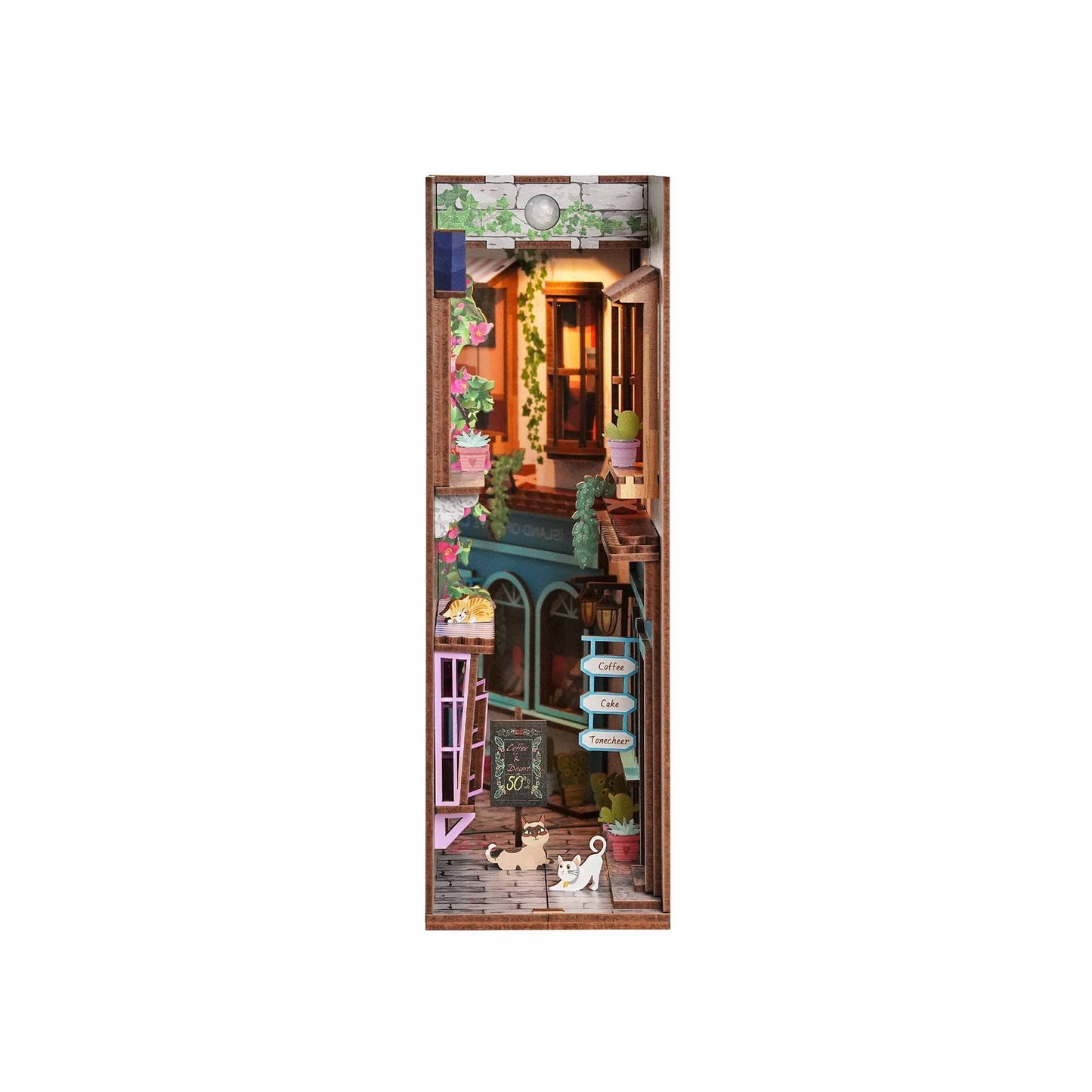Miniature dollhouse with detailed interior on a white background