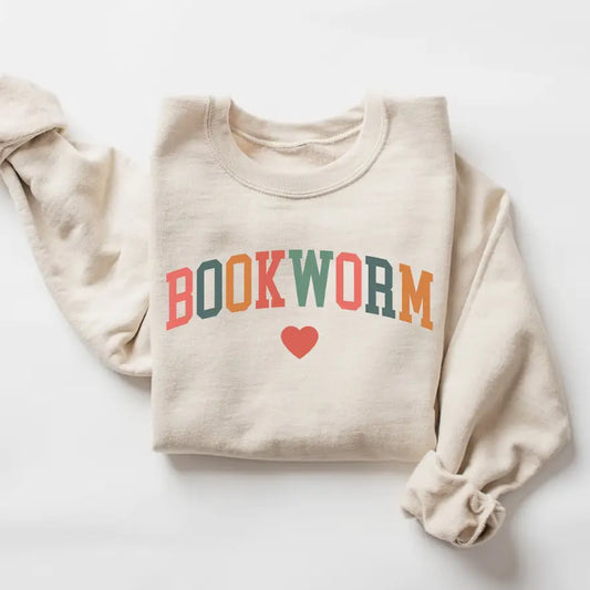 Beige sweatshirt with 'BOOKWORM' text in multicolor and a red heart on a white background