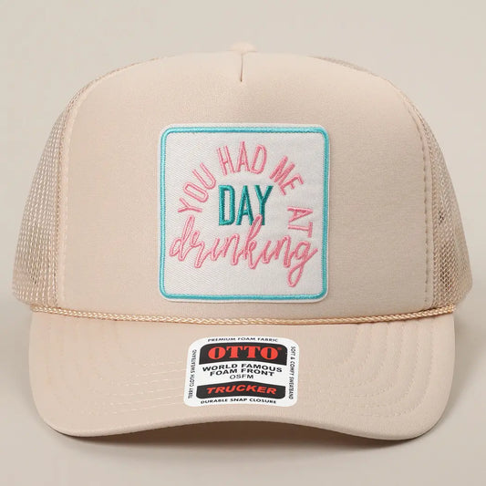 tan trucker hat with a patch that says "You had me at day drinking"