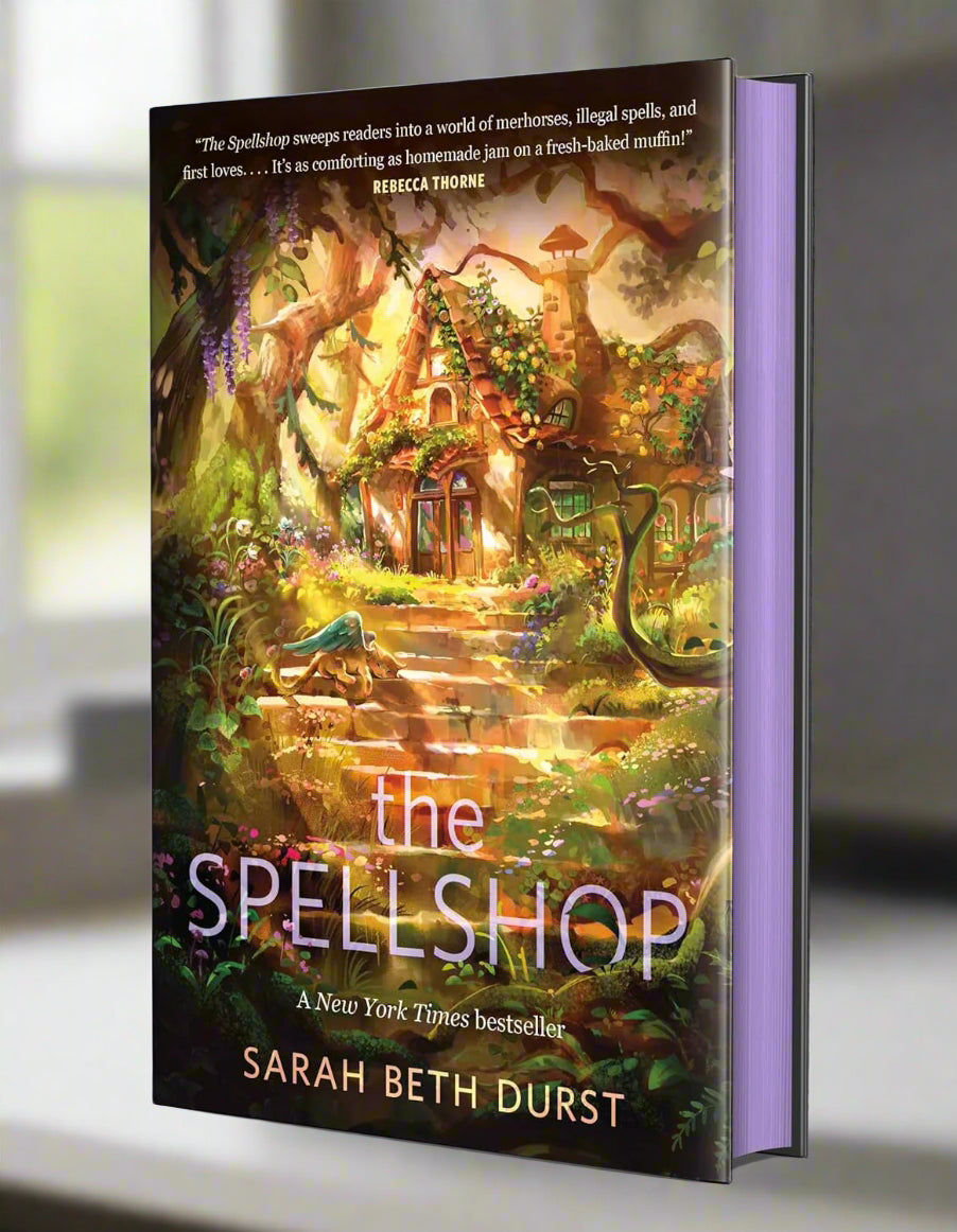 Book cover of 'The Spellshop' by Sarah Beth Durst with a fantasy-themed illustration.