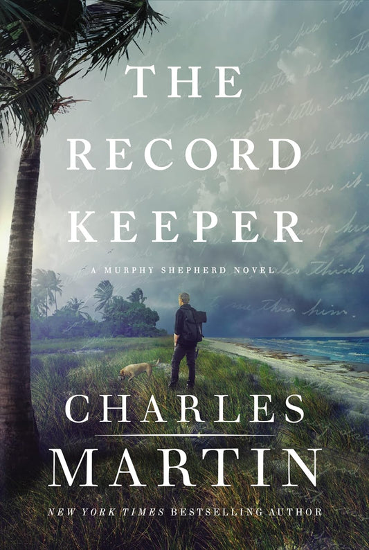 Book cover of 'The Record Keeper' by Charles Martin with a person walking a dog on a grassy path near a palm tree.