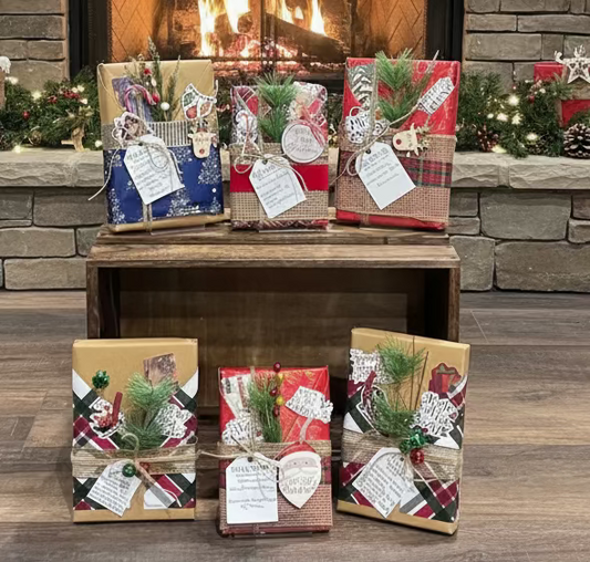 Collection of Christmas-themed greeting cards on a wooden surface with a bookshelf in the background.