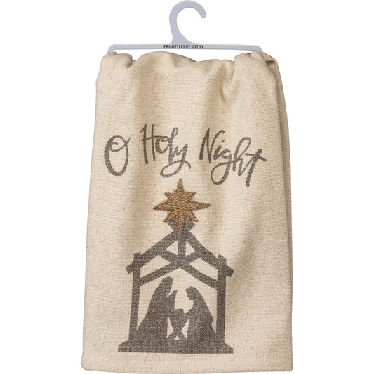 Beige towel with nativity scene and 'O Holy Night' text on a hanger