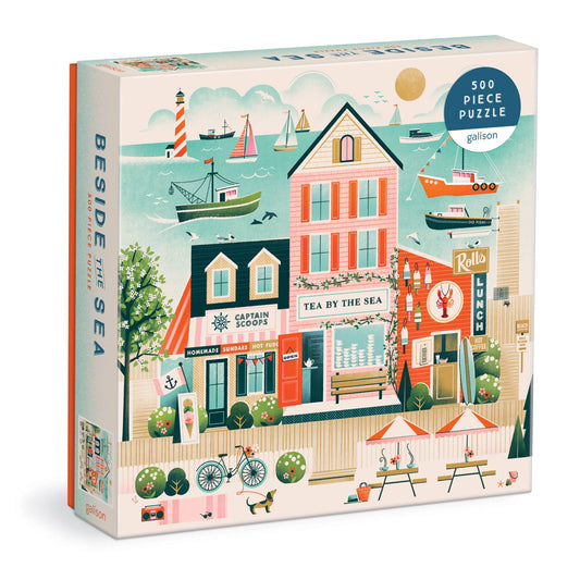 Puzzle box with a coastal scene design featuring buildings and sea elements.