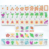 Set of colorful keyboard stickers with various designs on a white background